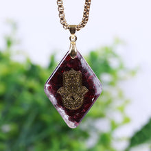 Load image into Gallery viewer, Orgonite Hamsa Natural Garnet Pendant
