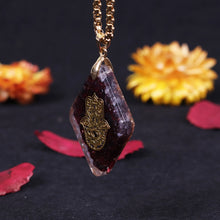 Load image into Gallery viewer, Orgonite Hamsa Natural Garnet Pendant
